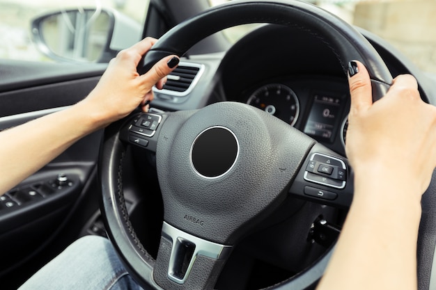 Woman driver driving a car