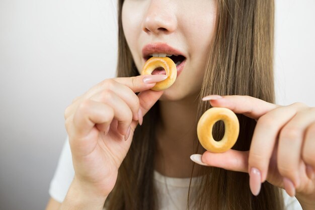 Woman eating bagels