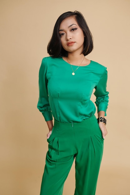 Woman in elegantt green suit