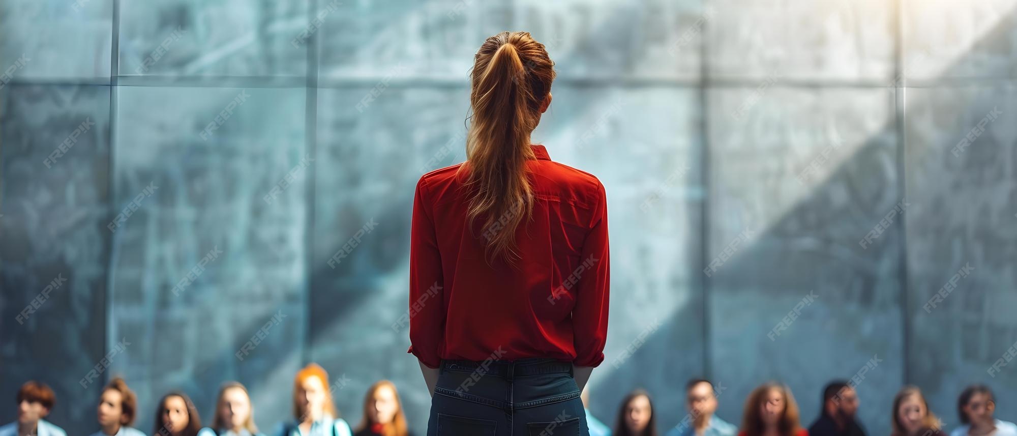 Premium Photo A Woman Engaging with a Group of People Concept Social(00)