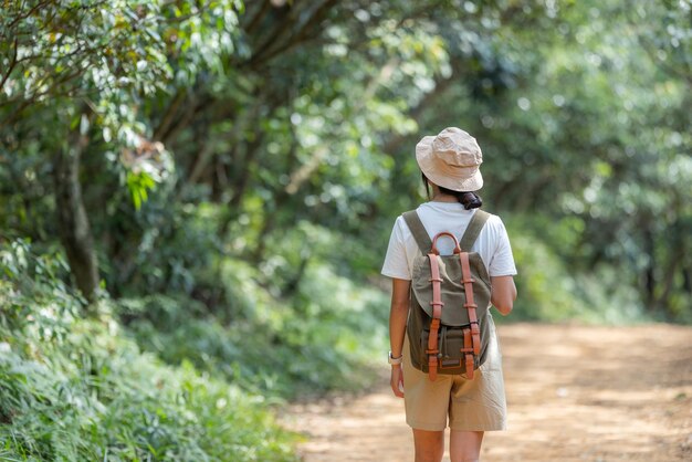 Woman enjoy hiking in the forest