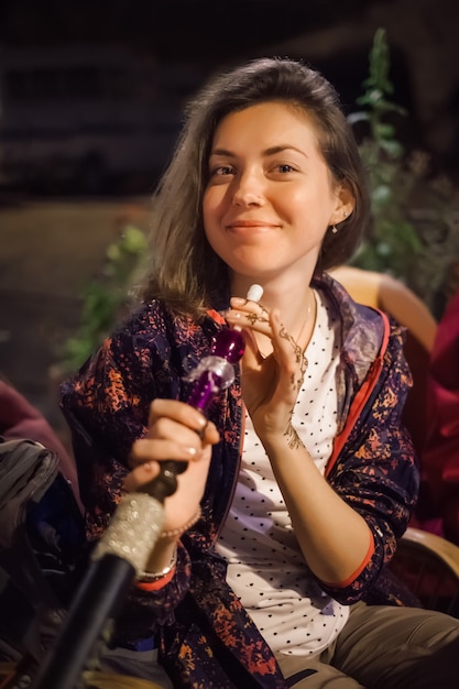 Woman enjoy hookah