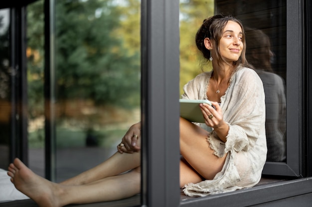 Woman enjoy nature at country house