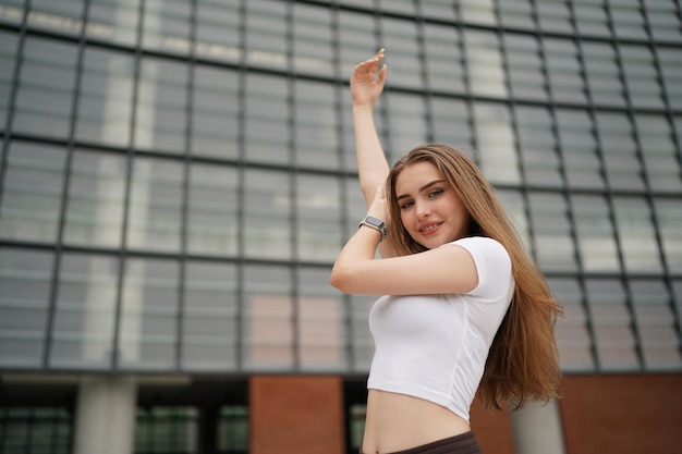 Woman enjoy posing in minimal white place. Minimal white place and background and beautiful blonde Caucasian lady in minimal cafe's interior.