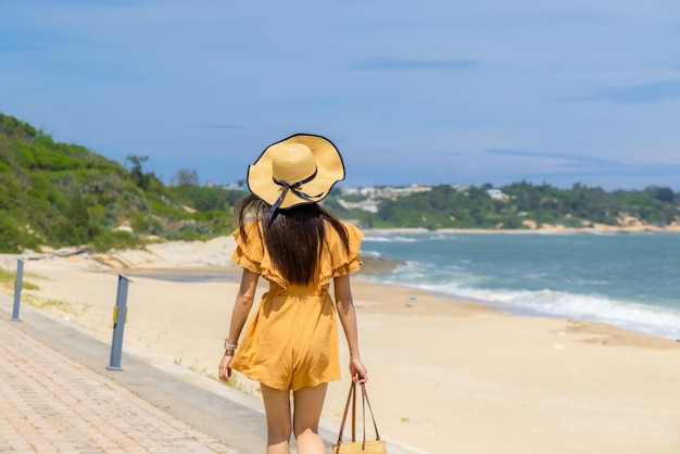 Woman enjoy the sand beach