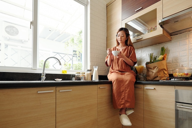 Woman Enjoying Bowl of Muesli