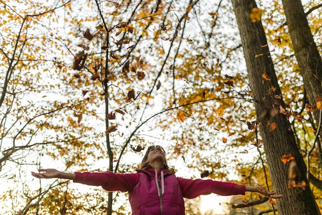 Woman enjoying the fall