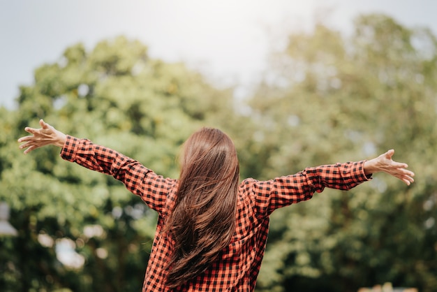 woman enjoying the fresh air in the park  