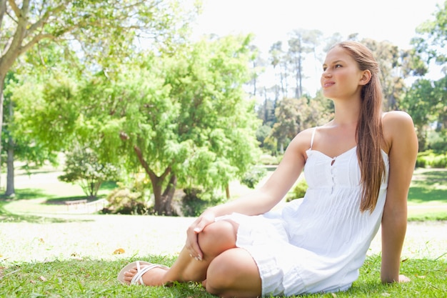 Woman enjoying her time on the lawn