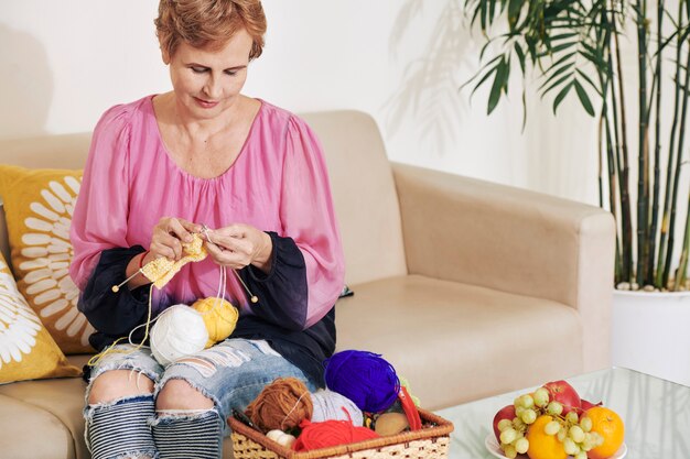 Woman enjoying knitting