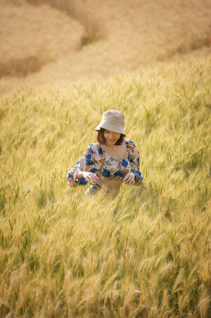 Woman enjoying nature in a farm field