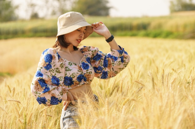 Woman enjoying nature in a farm field