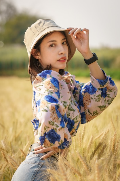 Woman enjoying nature in a farm field