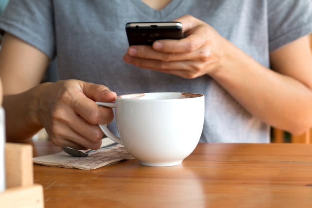 Woman enjoying warming drink, Late coffee in a cup