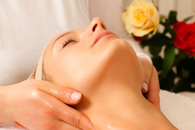 Woman enjoying wellness head massage