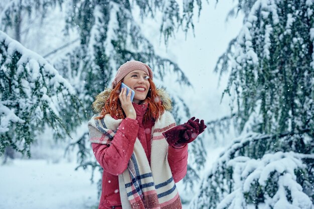 Woman enjoying a winter day and having call