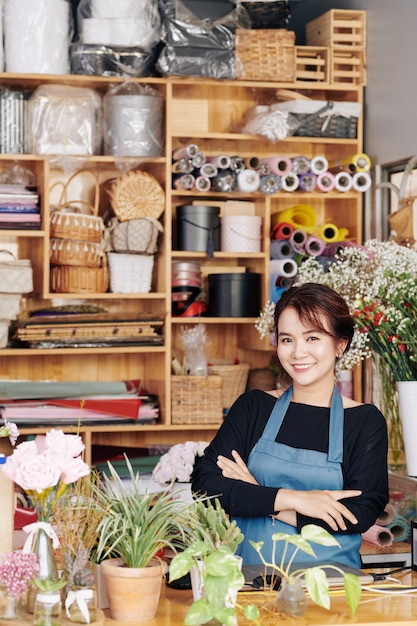 Woman enjoying working at flower shop