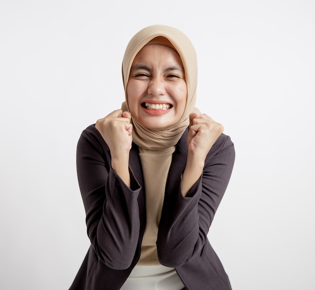 Woman entrepreneur wearing hijab exasperated expression office work concept isolated white background