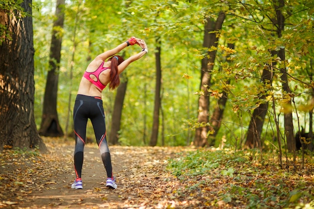 Woman exercising before jogging