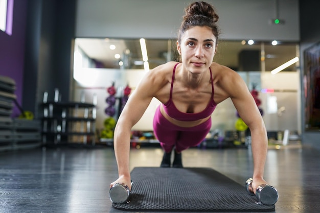 woman exercising at gym