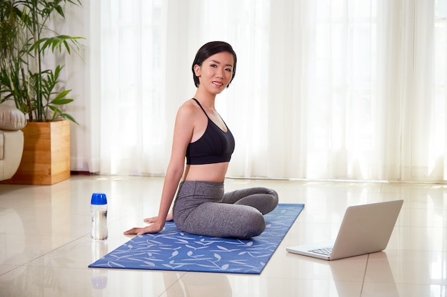 Woman exercising at home