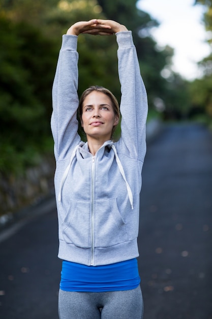 Woman exercising on the open road