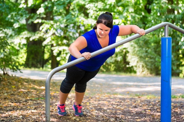 Woman exercising in park