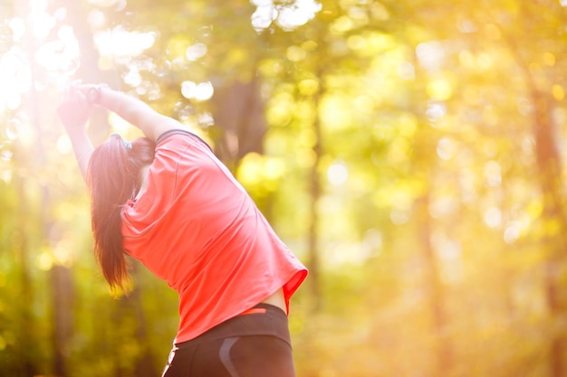 Woman exercising in park