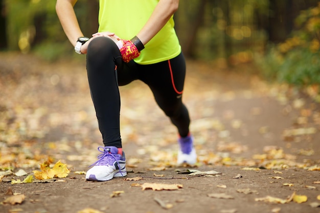 Woman exercising and stretching muscles