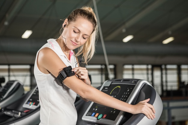 woman exercising on a treadmill in a gym