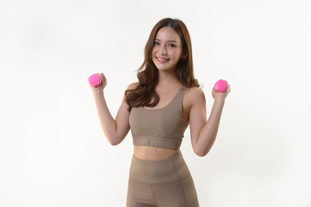 woman exercising with dumbbells