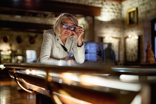 Woman exploring medieval expositions in museum