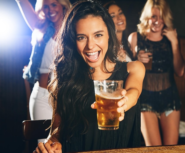 Woman face or beer toast at night party clubbing event or social gathering at holiday music festival summer break or freedom Portrait happy smile or alcohol cheers for students or concert girls