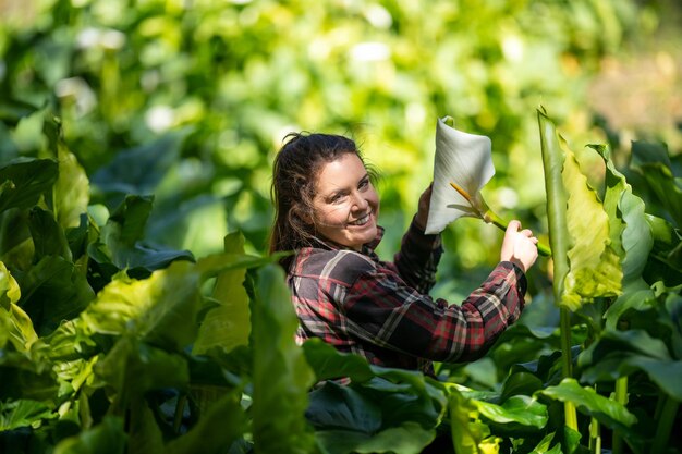 woman farmer in a flower field on a farm