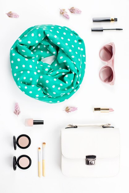 Woman fashion and beauty accessories - purse, sunglasses, scarf, cosmetics. Spring concept fashion collection.