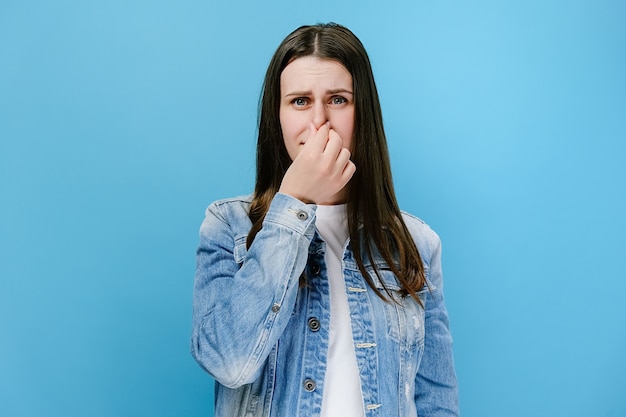 Woman feeling bad and dislike smell