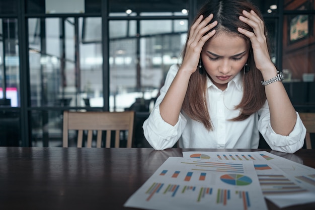 a woman in feeling exhausted and depressed from frustrated. anxiety concept.