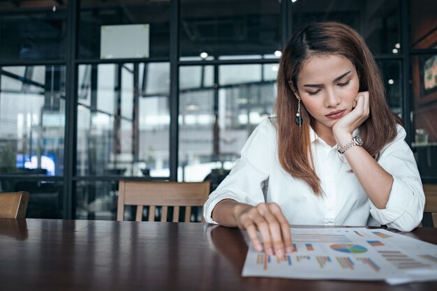 a woman in feeling exhausted and depressed 