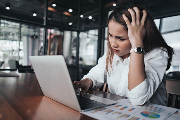 a woman in feeling exhausted and depressed