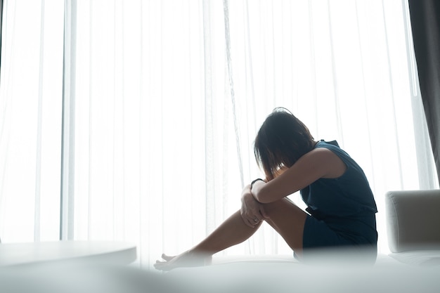 Woman feeling sad at window, lonely, broken heart, woman unhappy, feel sick, sad girl, girl feel sad