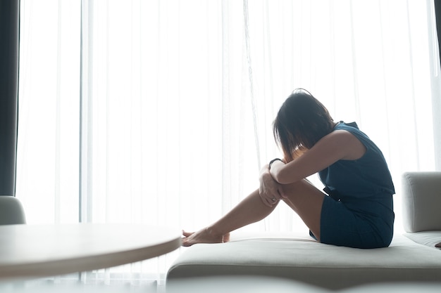 Woman feeling sad at window, lonely, broken heart, woman unhappy, feel sick, sad girl, girl feel sad