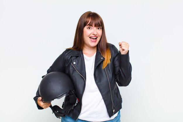 Woman feeling shocked, excited and happy