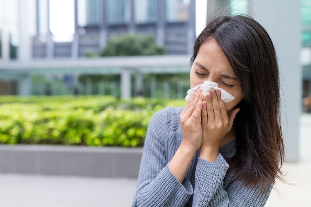 Woman feeling sick at outdoor