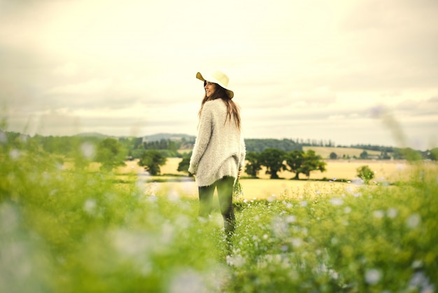 Woman in a field of flowers