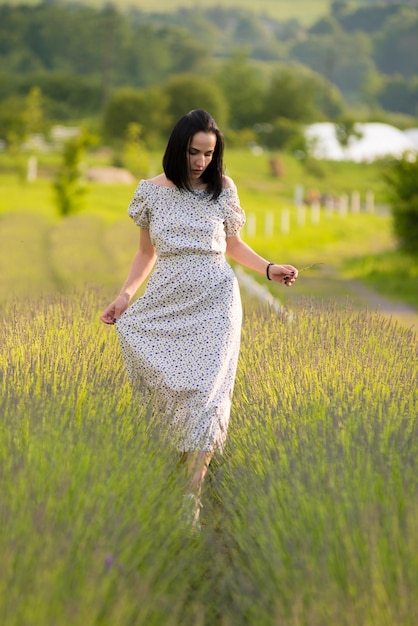 A woman in a field of lavender