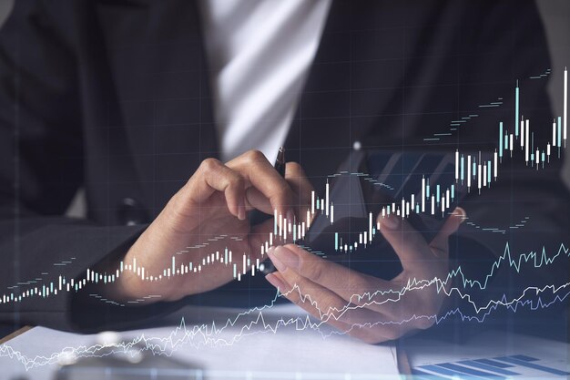 A woman financial trader in formal wear is checking the phone to sign the contract to invest money in stock market Internet trading and wealth management concept Forex hologram chart