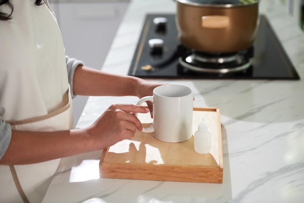 Woman Fixing Broken Mug