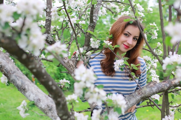 Woman and flowers tree apple