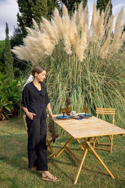 Woman at garden getting ready for a dinner