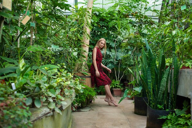 Woman in the garden on resort Wearing light summer clothes